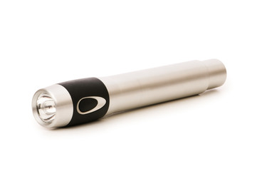 Silver flashlight isolated on the white background