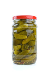 Glass jar with marinated cornichons