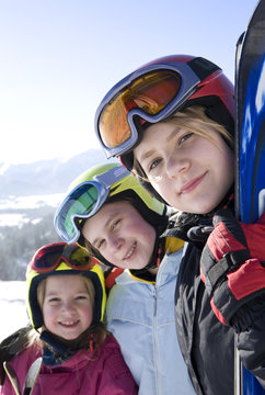 Happy girls with ski