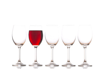 Glasses with red wine on white background