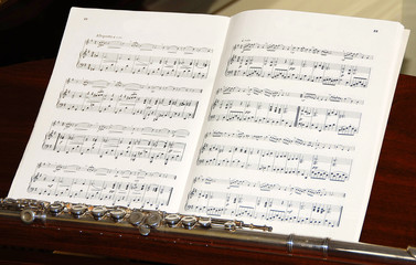 sheet of music and flute