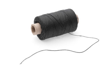 The coil of  black threads on white background