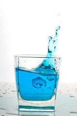 Glass of pouring water