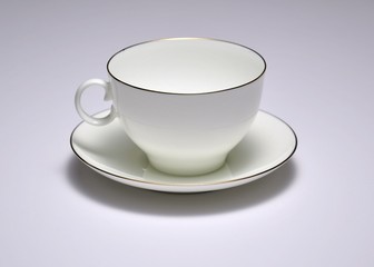 Russian porcelain cup and saucer with golden rim