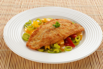 Fried fish fillet with vegetables