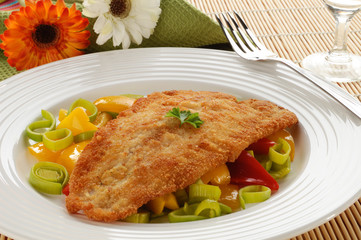 Fried fish fillet with vegetables