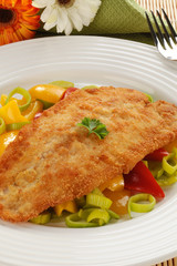 Fried fish fillet with vegetables