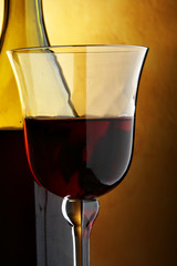 Glass and bottle of red wine