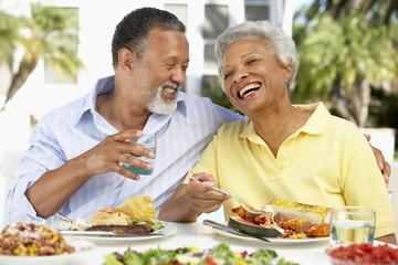 Couple Eating An Al Fresco Meal