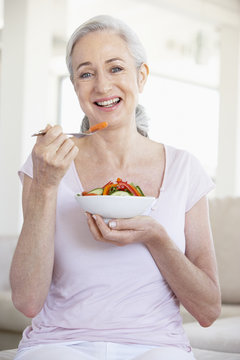 Senior Woman Eating Salad