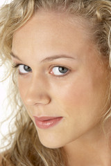 Naklejka premium Portrait Of Young Woman Looking At Camera