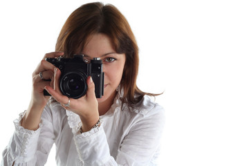 young woman with old camera isolated on white background