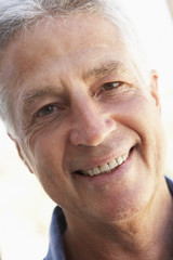 Portrait Of Middle Aged Man Smiling At The Camera