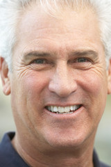Senior Man Smiling At The Camera