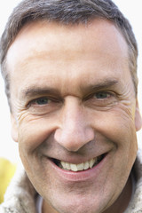 Middle Aged Man Smiling At The Camera