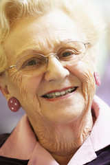 Portrait Of Senior Woman Smiling At Camera