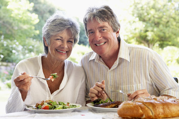 Couple Eating An Al Fresco Meal