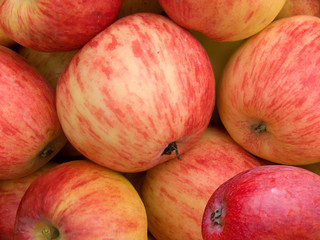Apples red an abstract background