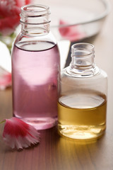 essential oils in bottles. spa and body care background
