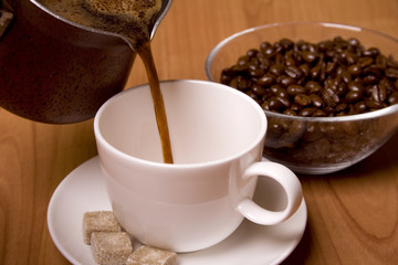 cup of coffee, sugar and beans