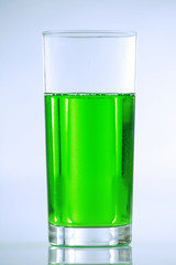 Green drink in tall glass