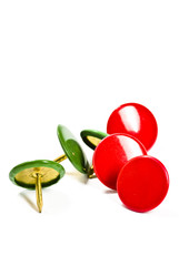 red and green thumbtacks