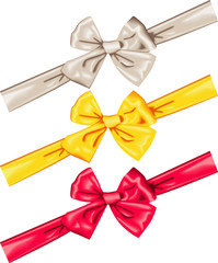 Vector satin bows in creamy white, red and yellow