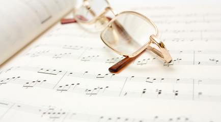 Glasses on book of notes
