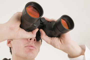 man with binoculars near