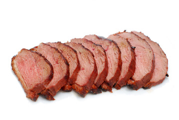 Magret de canard sur fond blanc.