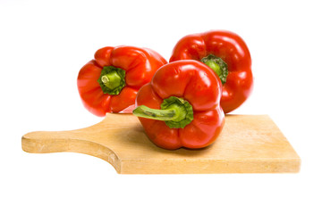 wooden cutting board with pepper