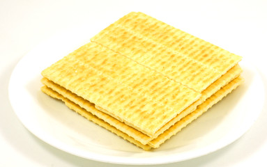 Gourmet crackers on dish.