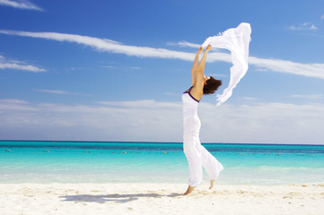 Fototapeta na wymiar happy woman with white sarong