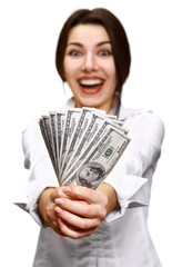 Happy young woman holding money