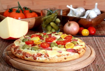 Italian pizza with ham and vegetable