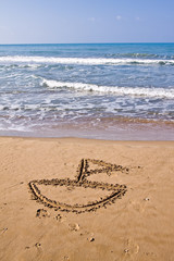 beautiful exotic beach in Mediterranean with a sign