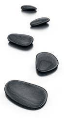 Black stones on reflective floor
