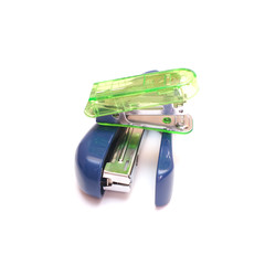 Staplers green blue isolated on white