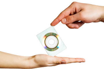 two hands hold a disc