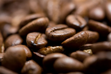 Freshly roasted coffee beans on sackcloth