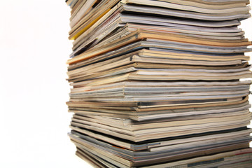 Stack of magazines isolated on white