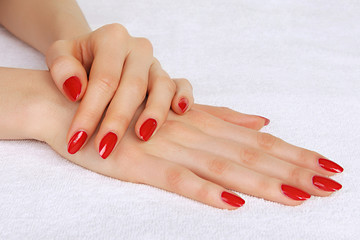 Beautiful hands with red manicure