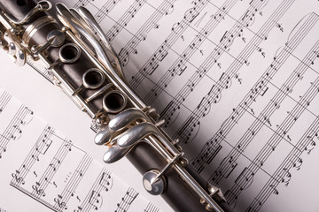 Clarinet isolated over sheet music