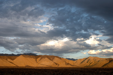 clouds over death valley dunes
