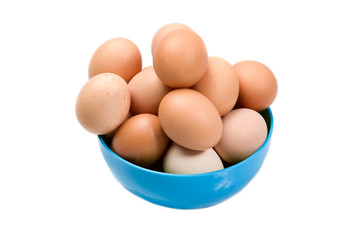 Photo of bowl with many brown hen eggs