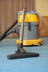 vacuum machine on carpet at meeting room