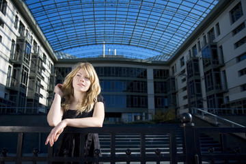 Blonde girl in a blue town