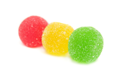 Sweet fruit color candy on white background