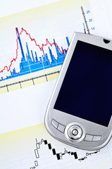 PDA and diagram of stock exchange