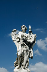 angel and bird in rome  on st. angel castle bridge, rome.